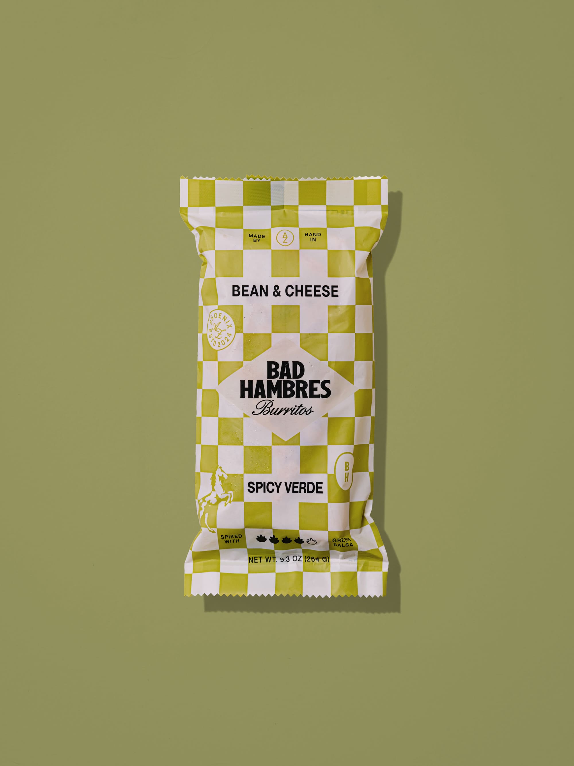 Product shot of a Bad Hambres Spicy Verde burrito packaging