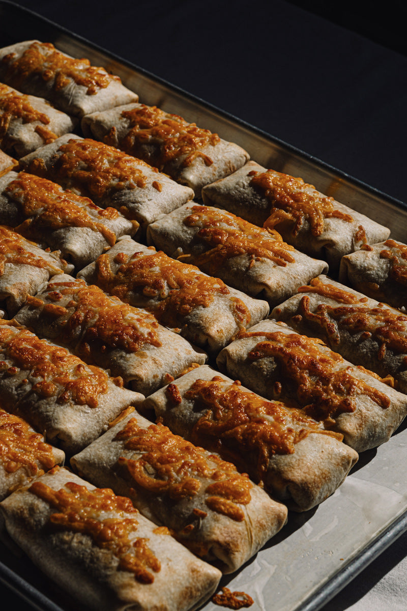 A tray full of Bad Hambres burritos with good lighting